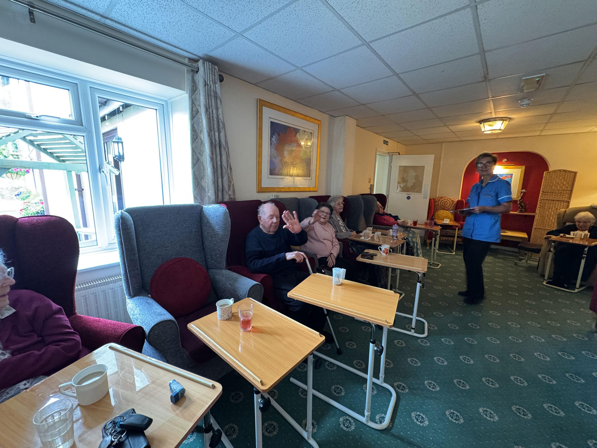 Comfortable communal lounge at Hollymead House